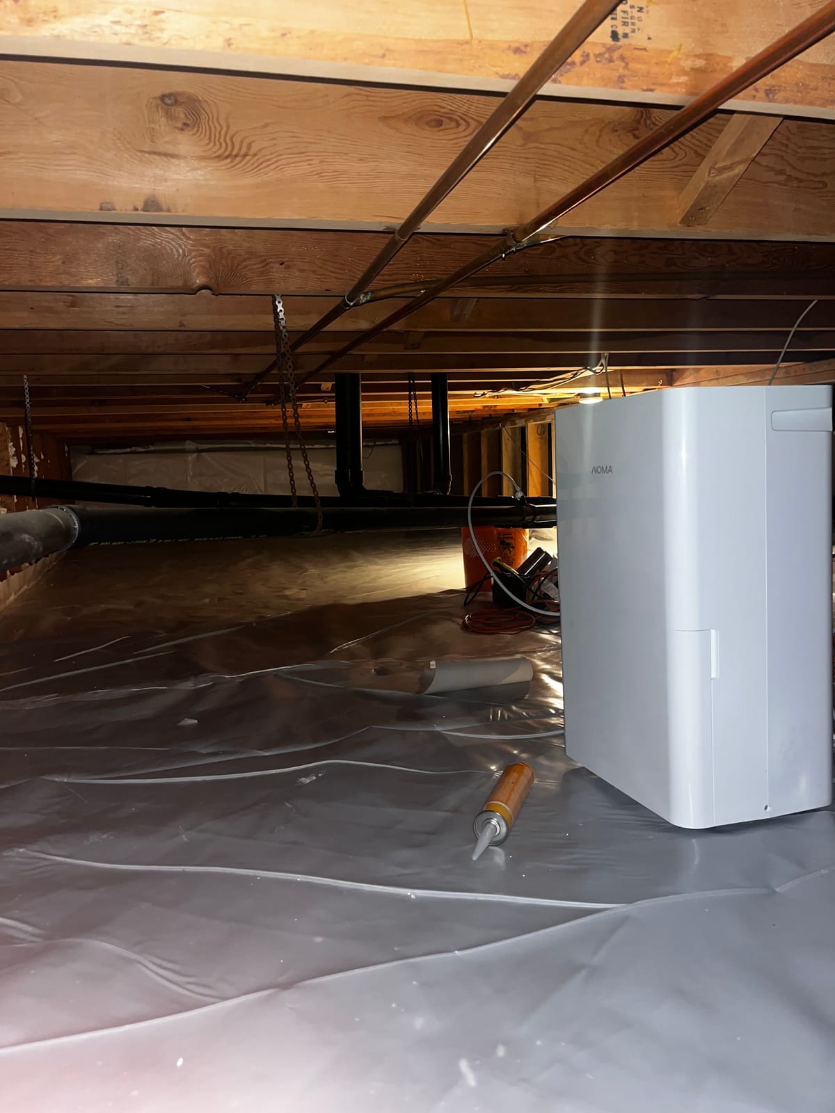 Dehumidifier set on the finished barrier
